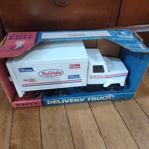Vintage steel and chrome true value delivery truck